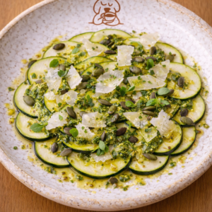 Carpaccio de courgettes avec ses copeaux de parmesan AOP.